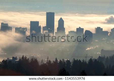 Sunrise over City of Portland Oregon Covered in Low Fog Banks