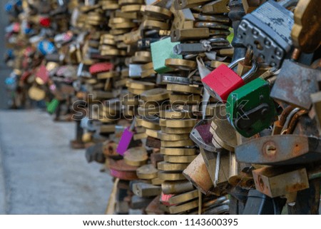 A blank red love padlocks ready for you to inscribe
