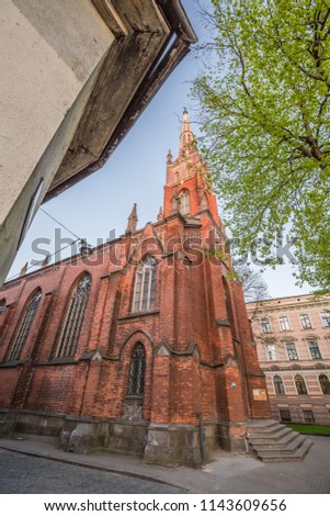 
cityscape. walking old town of Riga. view of St. Saviour's Anglican Church in Riga, Latvia