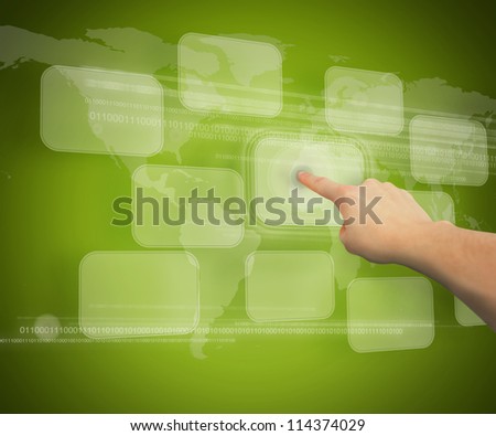 Finger touching one digital button against green background