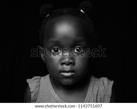 Black and white portrait of young girl Royalty-Free Stock Photo #1143751607