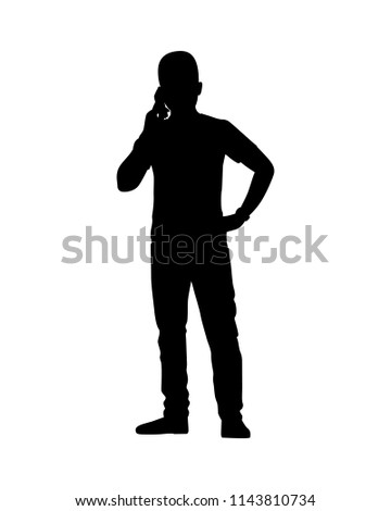 Standing young man with cellphone silhouette vector