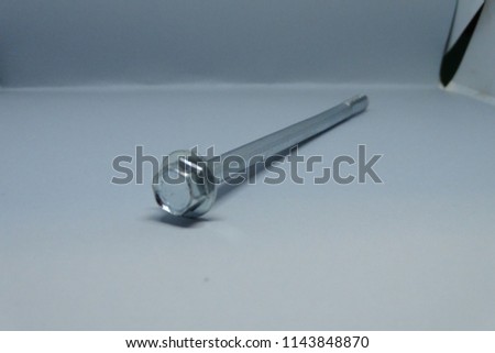 screw iron silver tool isolated over white background close up