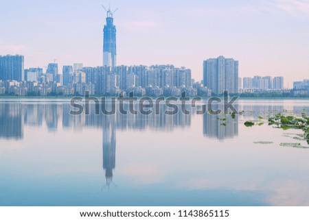 Empty Lake and modern city skyline panorama in Wuhan China