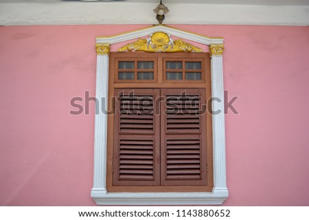 wooden window with beautiful pink wall