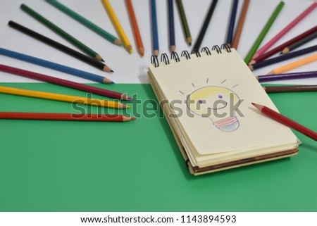 The light bulb was drawn by a wooden pencil on a notebook.
It is a symbol of sparking ideas.