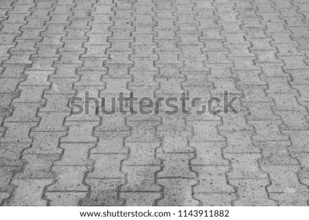 pavement stone slab texture background seen from above with a perspective