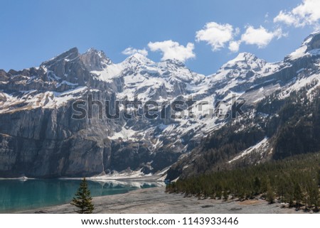 Amazing tourquise Oeschinnensee with Swiss Alps Kandersteg switzerland