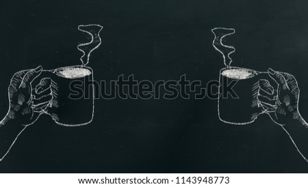 Chalk hand drawing a hand holding coffee cup with steam on black board on the left and right side of the frame.