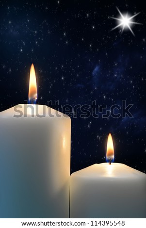 Two candles with Star of Bethlehem