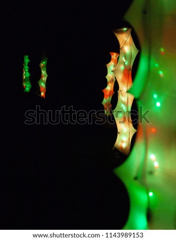 Abstract neon outdoor lights with shape of cactus