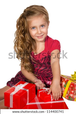beautiful  little girl  sitting with   presents in a box set isolated on white