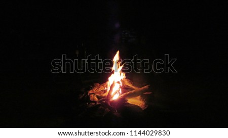 Camp fire burning.			
