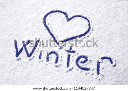 background image with the words love winter on snow