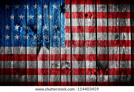The USA flag painted on wooden pad