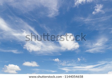  Transparent blue sky with clouds and atmospheric afternoon.