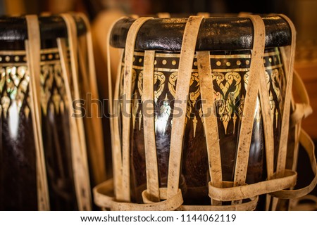 There are many kinds of drums in Thai musical instruments band that made from wood and leather elaborately.