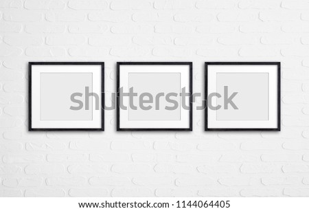 Photo frames collage mockup on white bricks wall background Royalty-Free Stock Photo #1144064405