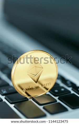 Cryptocurrency. Ethereum Coin On Computer Close Up