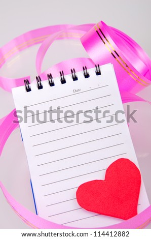 Note book and heart shape