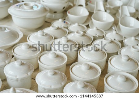 White ceramic bowl or plastic bowl on sale in street market . selective focus
                               