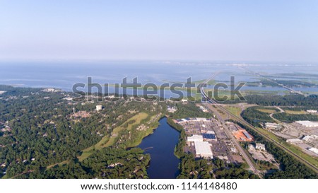 Aerial view of the Eastern shore of Mobile Bay and Lake Forest in Daphne, Alabama
