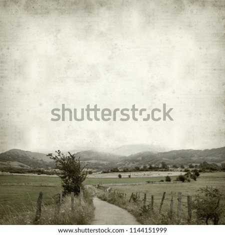 textured old paper background with rural landscapes of Cantabria, North of Spain 
