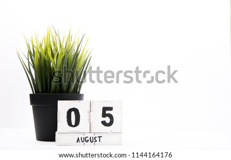 August 5. Image of August 5, close-up of numbers and letters on white background. Summer day