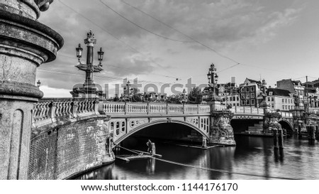 Bridges and embankments of Amsterdam. Black-white photo.