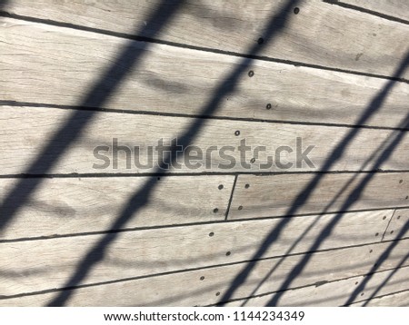 Shadows of rigging on deck of ship, Hartlepool, England