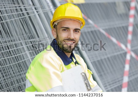 construction engineer looking at the camera