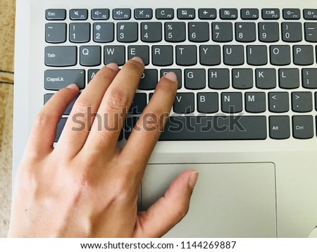 Keyboard / A computer keyboard is a typewriter style device which uses an arrangement of buttons or keys to act as mechanical levers or electronic switches Royalty-Free Stock Photo #1144269887