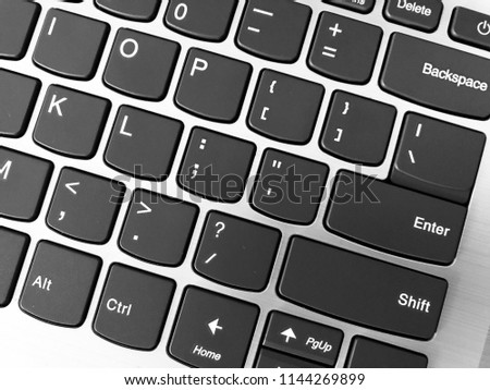 Keyboard / A computer keyboard is a typewriter style device which uses an arrangement of buttons or keys to act as mechanical levers or electronic switches Royalty-Free Stock Photo #1144269899