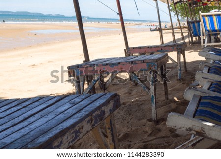 Pictures of vacation places There are tables and chairs for tourists on Pattaya beach.