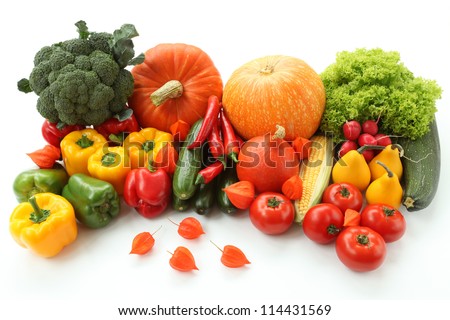 Colorful autumn veggies on isolated white background