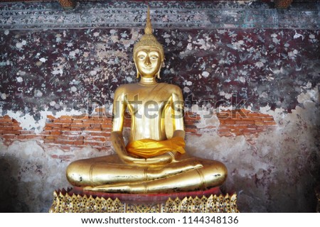Gold Buddha Image, The attitude at meditation in Temple at Bangkok, Thailand