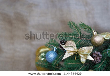 Merry Christmas greeting card. Christmas background with a Christmas tree and Christmas tree decorations.