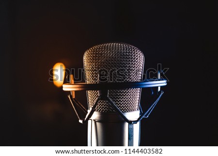 professional Studio condenser microphone on black background