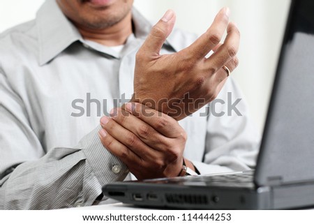 Man with hand pain.Close up. Royalty-Free Stock Photo #114444253