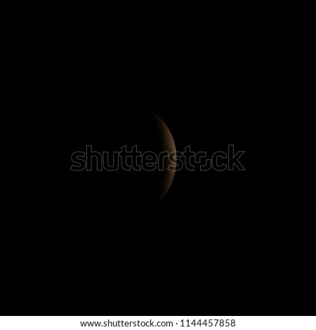Omsk, Russia - July 28, 2018: The moment of a total lunar eclipse