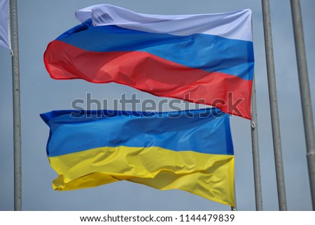 ukrainian and russian flag