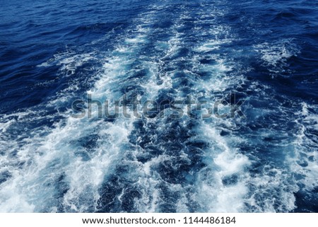 blue adriatic sea water burst with white foam. Croatia