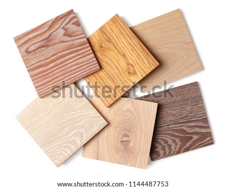 group of eight small samples of wooden parquet from different types of wood, different colors and textures for the designer's work. isolated on white background Royalty-Free Stock Photo #1144487753