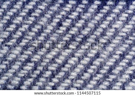 Blue and White background structure of a rough fabric.