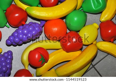 Pattern of toys in the form of fruits and vegetables