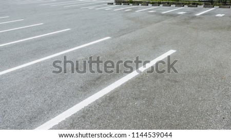 Asphalt Floor, Empty parking lot at city center, Vacant Parking Lot, Parking lane painting on floor, copy space