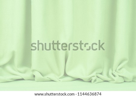 crumpled fabric background and texture. Abstract background, empty template. Selective focus.