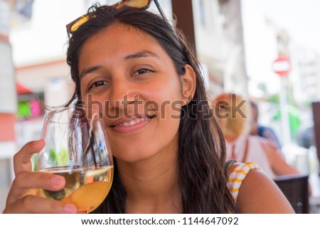 young woman drinking wine