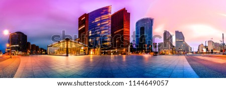 Skyline of the financial district at the Potsdammer Platz in Berlin, Germany. Panoramic montage with artistic filters applied Royalty-Free Stock Photo #1144649057