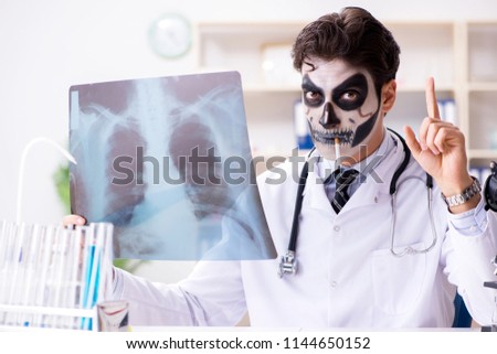 Scary monster doctor working in lab Royalty-Free Stock Photo #1144650152